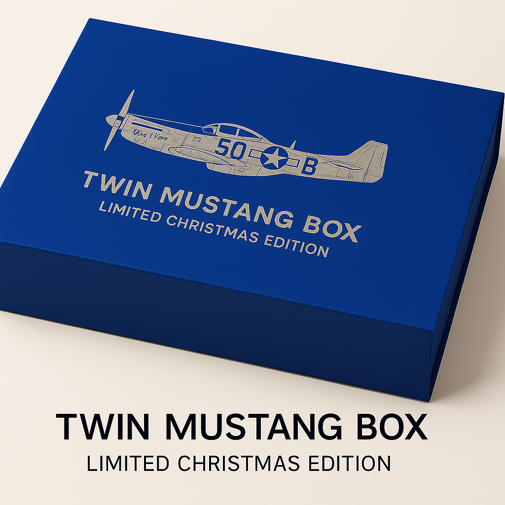 Blue box with airplane design and text 'Twin Mustang Box Limited Christmas Edition' on a beige background